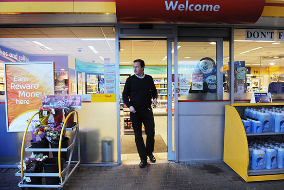 Cameron's 24 hours: David Cameron at a 24-hour petrol station in Grimsby to buy a newspaper 