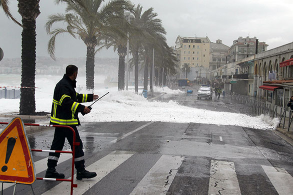 French Riviera flooding: A fireman secures the area in Nice