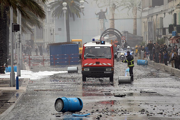 French Riviera flooding: Firemen at work on the Promenade des Anglais