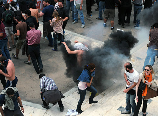 Strike in Greece: Riot policemen clash with protestors in the centre of Athens