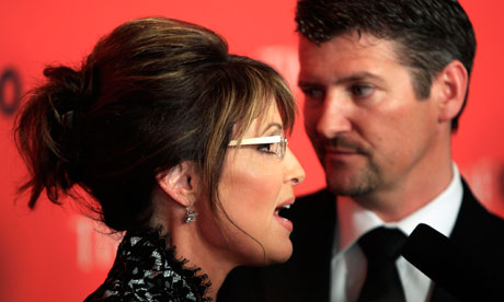 Former Republican vice-presidential candidate Sarah Palin, left, and her husband Todd