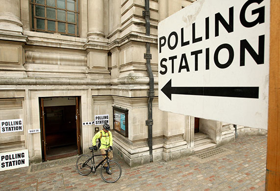 Polling: A voter leaves the Methodist Central Hall in Westminster