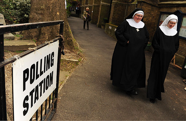 Voting Gallery: Nuns voting at St. John's Lancaster Gate, polling station