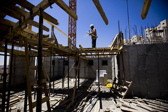 24 hours in pictures: Har Homa, Jerusalem: A Palestinian construction worker