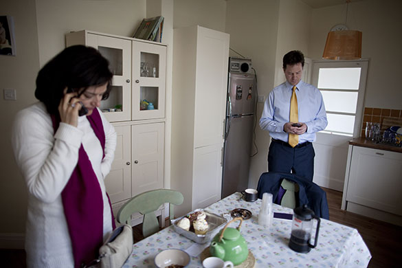 Clegg on polling day: Lib Dem leader Nick Clegg waits for the results at his home 