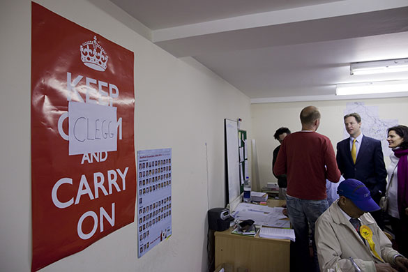 Clegg on polling day: Lib Dem leader Nick Clegg visits the Lib Dem campaign HQ in Sheffield