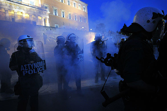 24 hours in pictures: Athens, Greek: Riot policemen during an anti-austerity demonstration