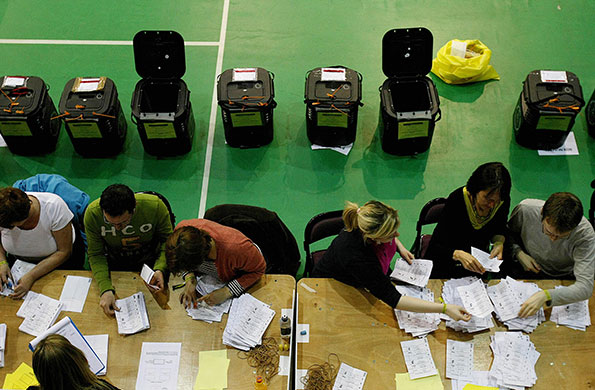 24 hours in pictures: Newtownards, Northern Irelans: Votes are counted at the Ards Leisure Centre
