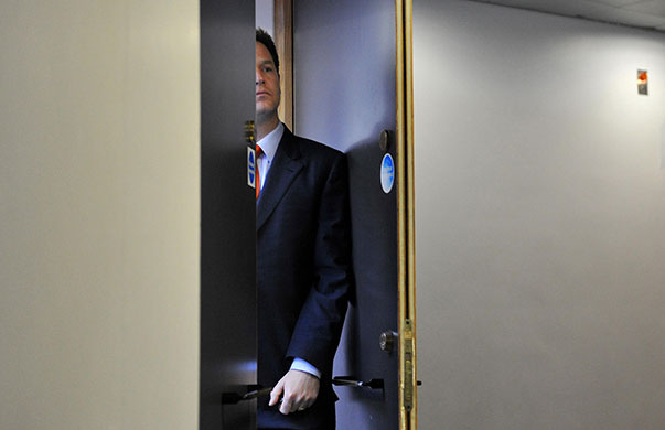 day after election night: Liberal Democrat party leader Nick Clegg listens to a speech