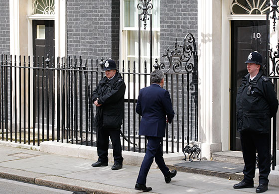 day after election night: Prime Minister Gordon Brown walks back into 10 Downing Street