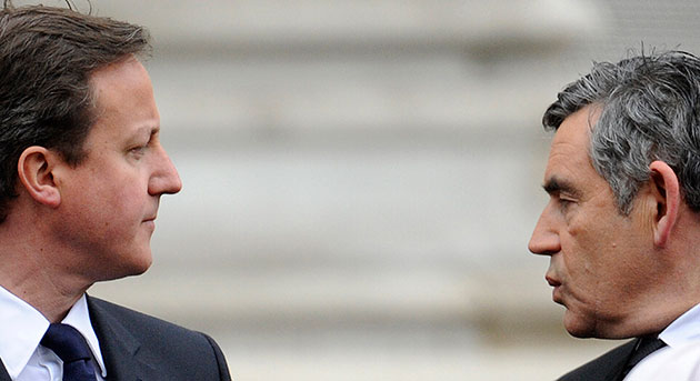 Saturday Politics: Gordon Brown stands opposite David Cameron during VE Day