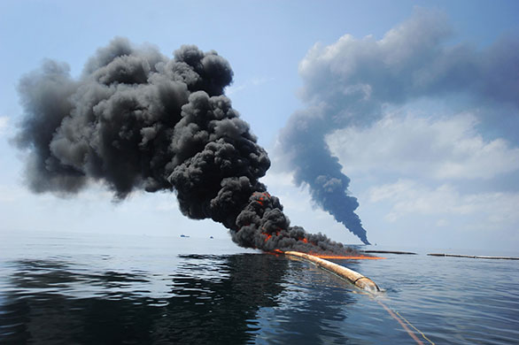 24 Hours in Pics: Oil burns during a controlled fire in the Gulf of Mexico