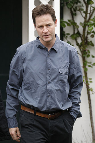Party leaders on Sunday: Nick Clegg walks out of his house to speak to the media
