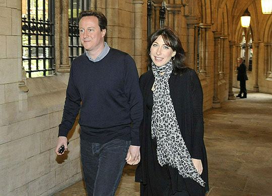 Hung parliament talks: David Cameron and his wife Samantha arrive for church service in Kensington