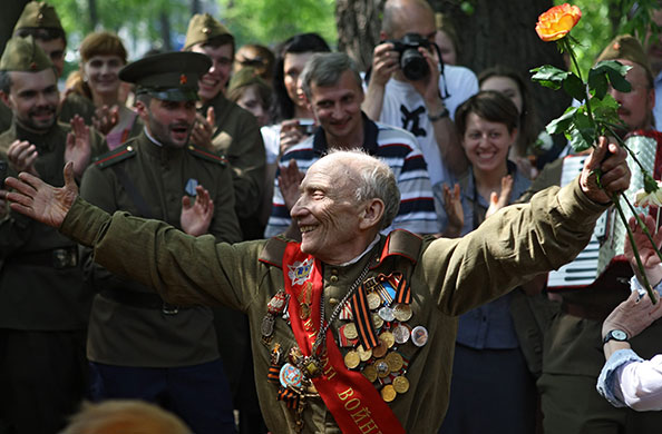 Victory day celebrations: A Russian veteran dances at Victory Day festivities at Gorky Park in Moscow