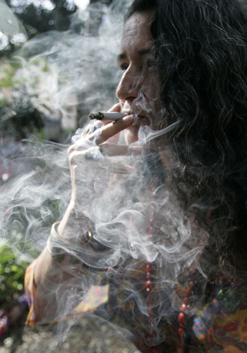 24 hours: Medellin, Colombia: A protester smokes marijuana during a demonstration