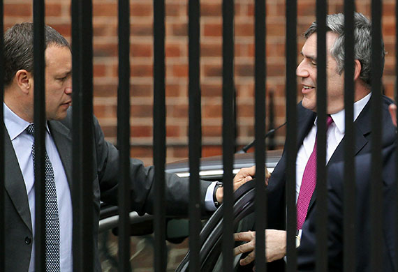 Hung parliament talks: Prime Minister Gordon Brown leaves his car at the rear of Downing Street 