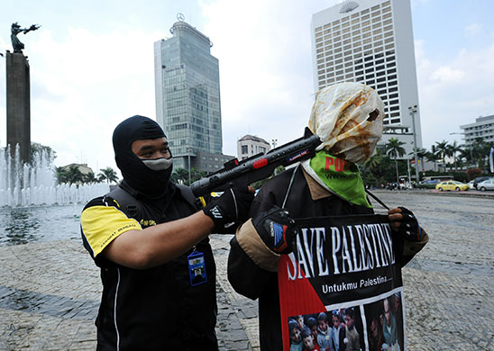 Israel protests: Indonesian students act uring a protest, in Jakarta, Indonesia