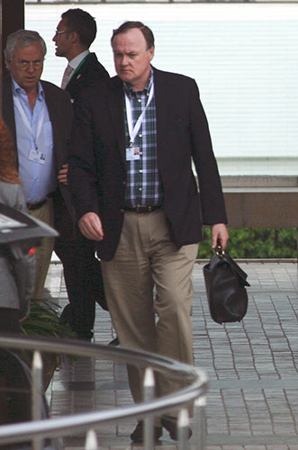 Bilderberg delegates:  “Let me through I’m a doctor!” But what’s in his Bilderbag? 