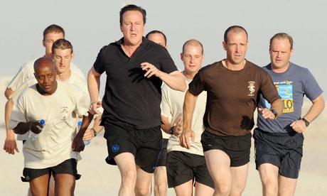 David Cameron goes for a run with British soldiers during his visit to Afghanistan on 11 June 2010
