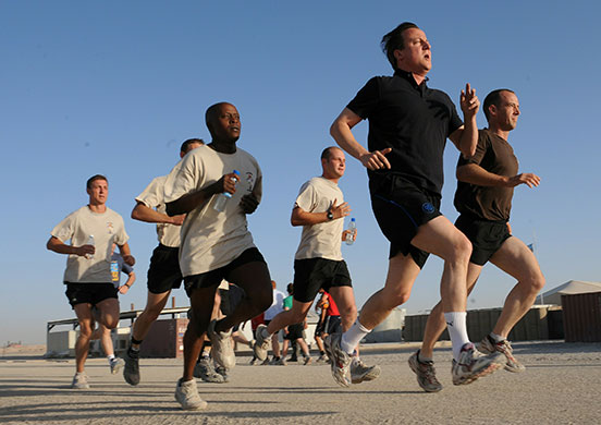 Cameron in Afghanistan: David Cameron goes for a run with British troops