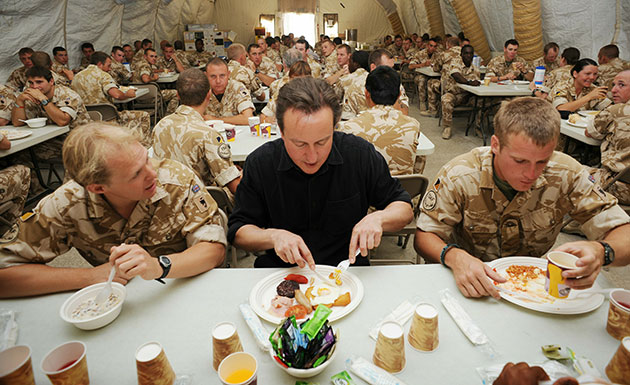 Cameron in Afghanistan: David Cameron speaks to British troops at breakfast