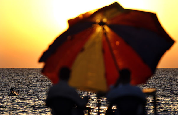 24 hours in pictures: fisherman off the coast of Gaza City, Gaza