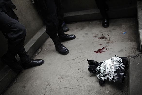 24 hours in pictures: Head of decapitated man in Guatemala City