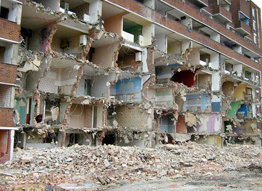 Market Estate Demolition: With the front walls ripped away, the interior décor is revealed