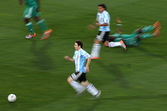 Messi runs through the Nigerian defence (Guardian Images)