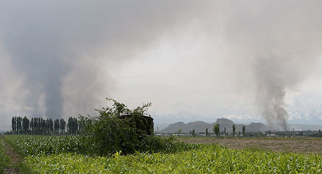 Kyrgyzstan violence: Smoke rises from ethnic Uzbeks' villages set on fire by Kyrgyz attackers