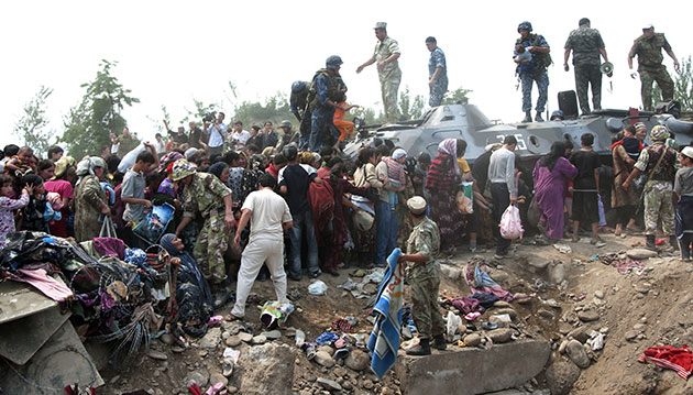 Kyrgyzstan violence: Uzbekistan soldiers and security officers assist ethnic Uzbeks