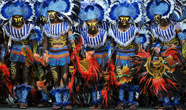 24 hours: Manila, Philippines: Filipino performers wait for their turn to dance