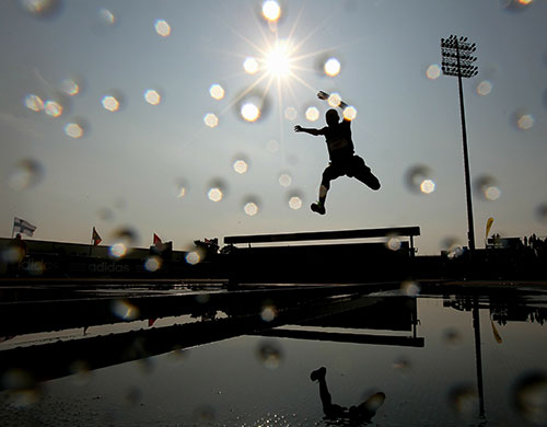 24 hours: New York City, USA:  A competitor passes over the water jump