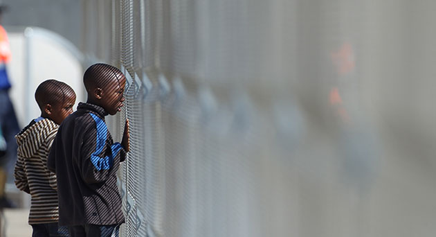24 hours: Johannesburg, South Africa: Young football fans watch New Zealand training