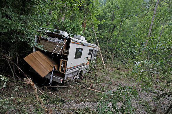 Arkansas floods: A flooded RV damaged by flash flooding at Albert Pike campground 