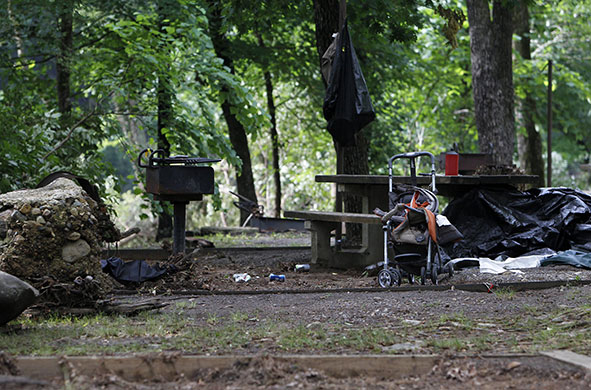 Arkansas floods: A stroller and a grill at Albert Pike camp ground near Caddo Gap, Arkansas