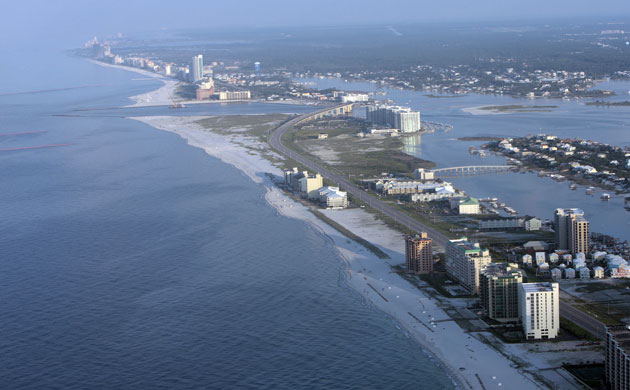 BP oil spill: Deepwater Horizon oil spill: A light sheen of oil along Orange Beach