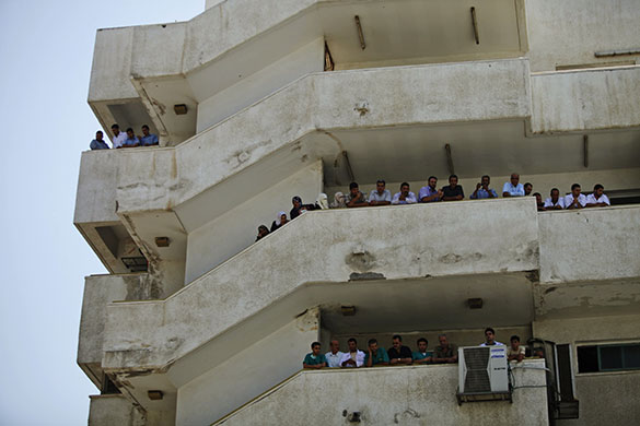 24 hours in pictures: Gaza City, Gaza: Workers and patients at Shifa hospital