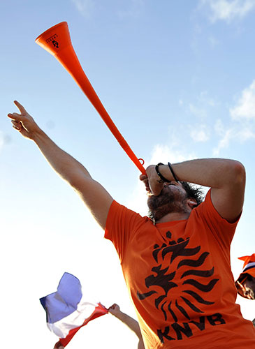 World Cup vuvuzelas: Dutch fan blows a vuvuzela