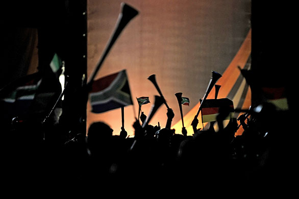World Cup vuvuzelas: Football fans wave flags and vuvuzelas