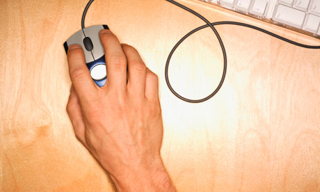 Hand using computer mouse