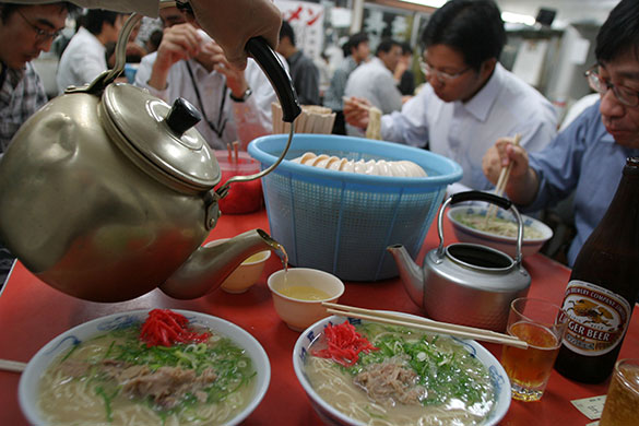 Ramen noodles: Eating ramen noodles in a ramen restaurant, Fukuoka city, Japan