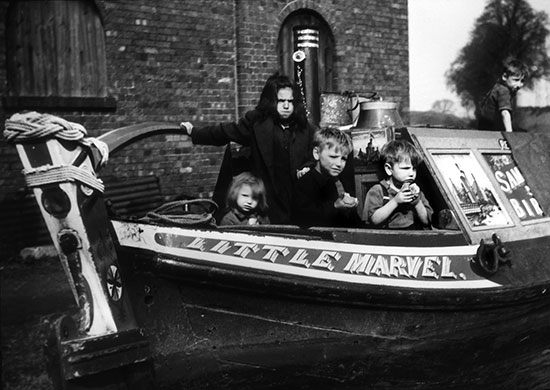 Longden's Canals: A group of children on a canal boat