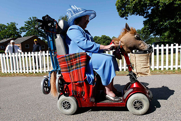 Ladies Day Ascot: A racegoer arrives on Ladies Day Royal Ascot