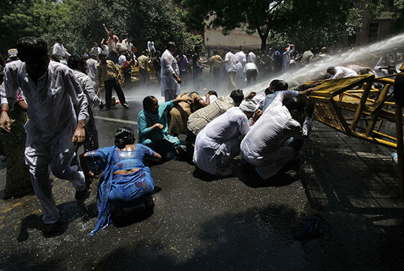 24 hours in pictures: New Delhi, India: Activists from the main opposition Bharatiya Janata Party