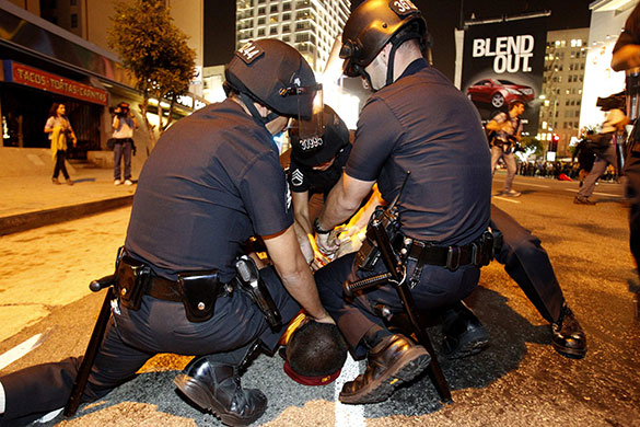 24 hours in pictures: Los Angeles, US: A person is arrested