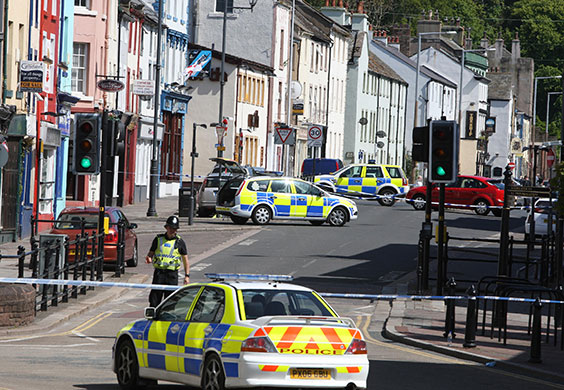 Cumbria shootings: Officers attend the scene on Duke Street in Whitehaven, where Darren Rewcastle was shot dead at 10:30am