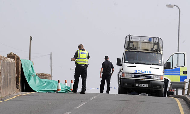 Whitehaven shootings: A  tarpaulin cover marks the site of yet another victim in Seascale