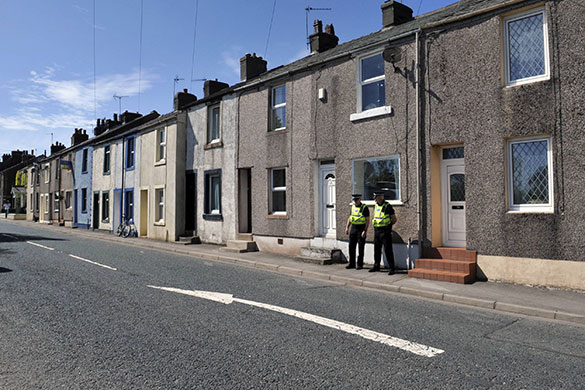 Whitehaven shootings: Police officers outside the home of Derrick Bird 